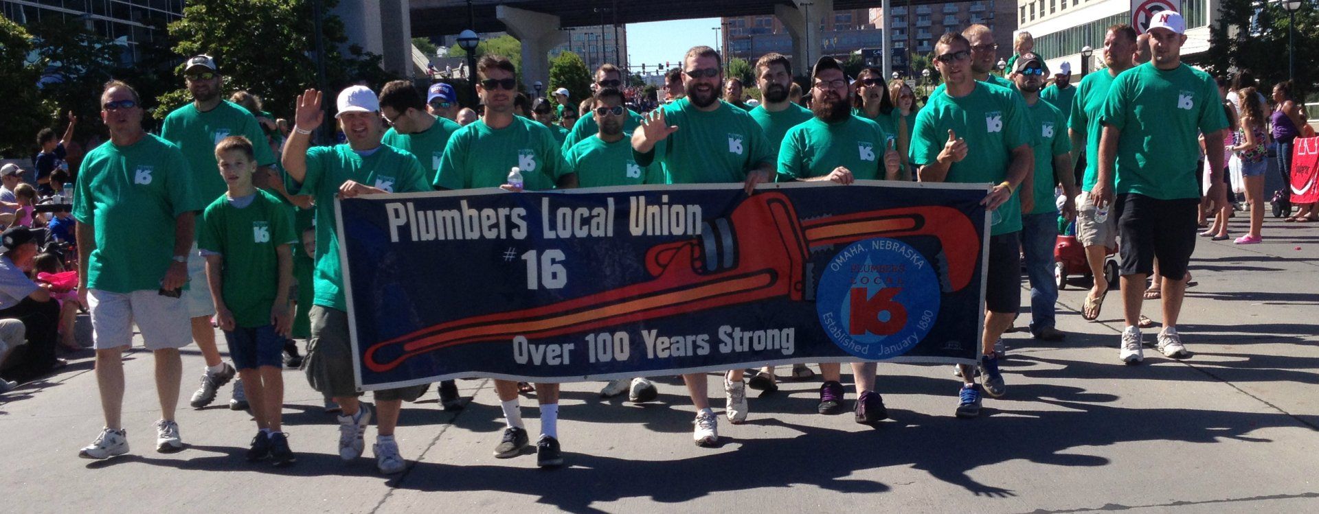 Local 16 members march in a parade