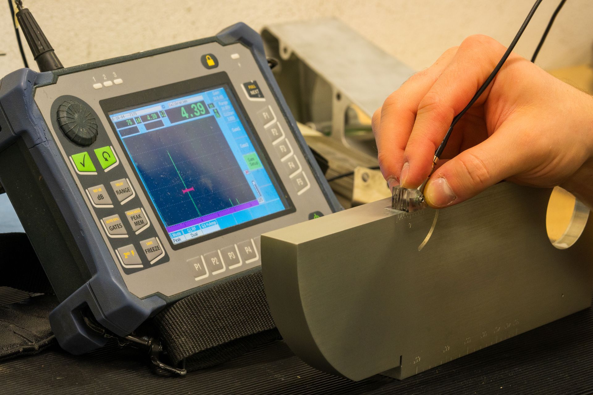 NDT inspection equipment and ultrasonic testing probe prepared for examining industrial metal compo