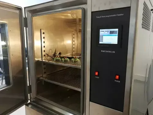 A thermal testing machine. A stainless steel thermal testing machine with a monitor on the side.