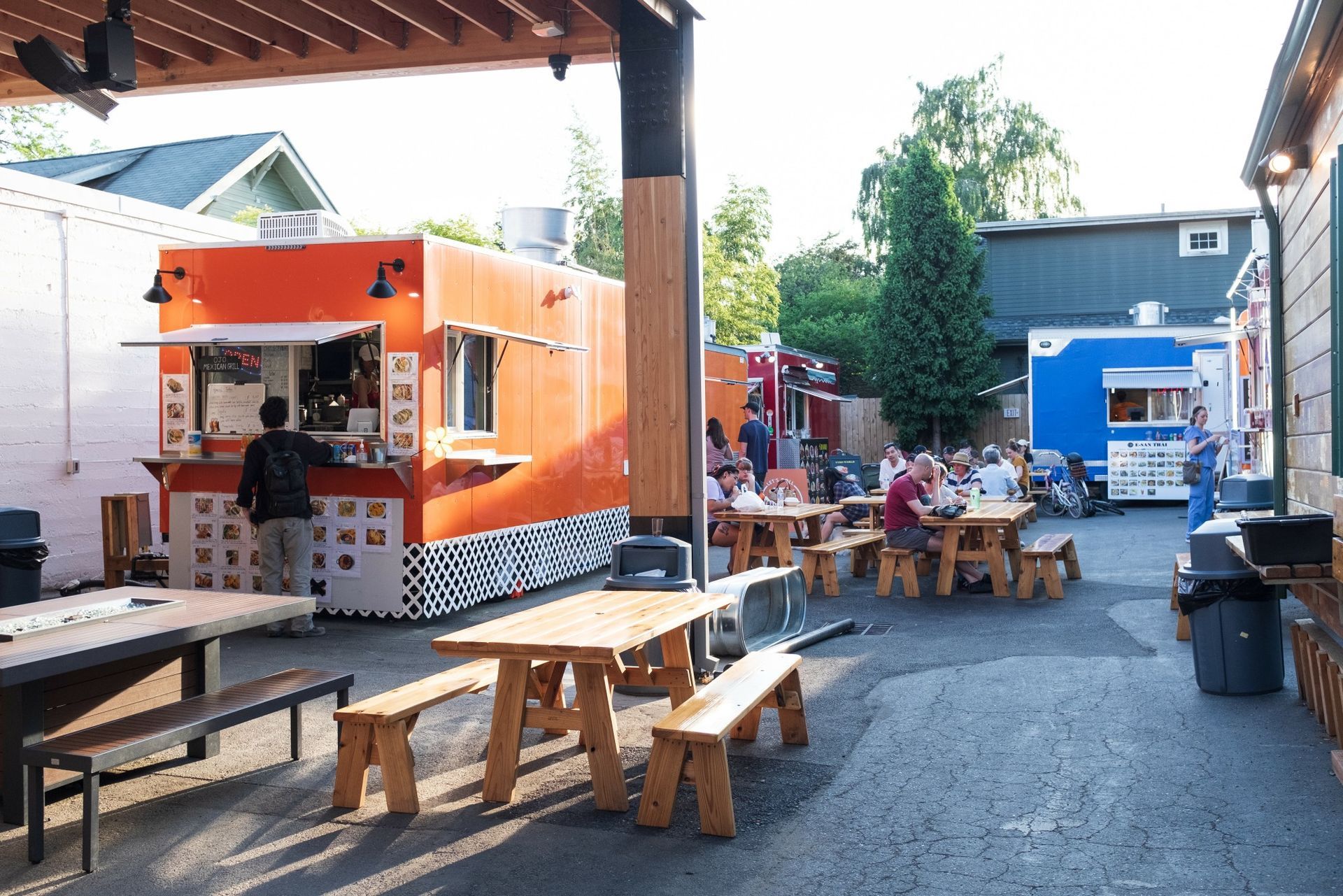 Farmhouse Carts offers a variety of food cart fare in the Division/Clinton neighborhood — order up a feast and chow down in their covered seating area. Credit: Nick Mendez Photography Farmhouse Carts in the Division/Clinton neighbourhood, Portland, Oregon