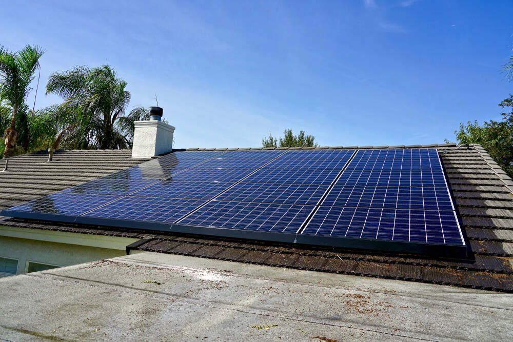 There Are Solar Panels on the Roof of a House — Abstract Window Cleaning in Pottsville, NSW