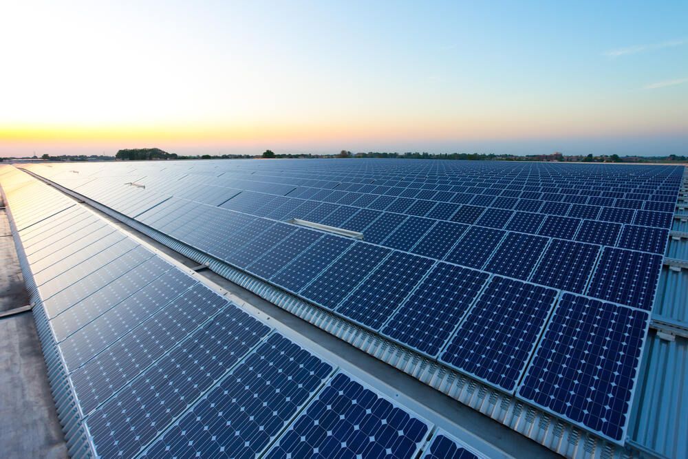 There Are Many Solar Panels on the Roof of a Building — Abstract Window Cleaning in Hopkins Creek, NSW