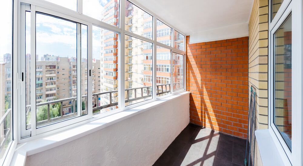 Balcony With a Lot of Windows and a Brick Wall — Abstract Window Cleaning in Tweed Heads, NSW