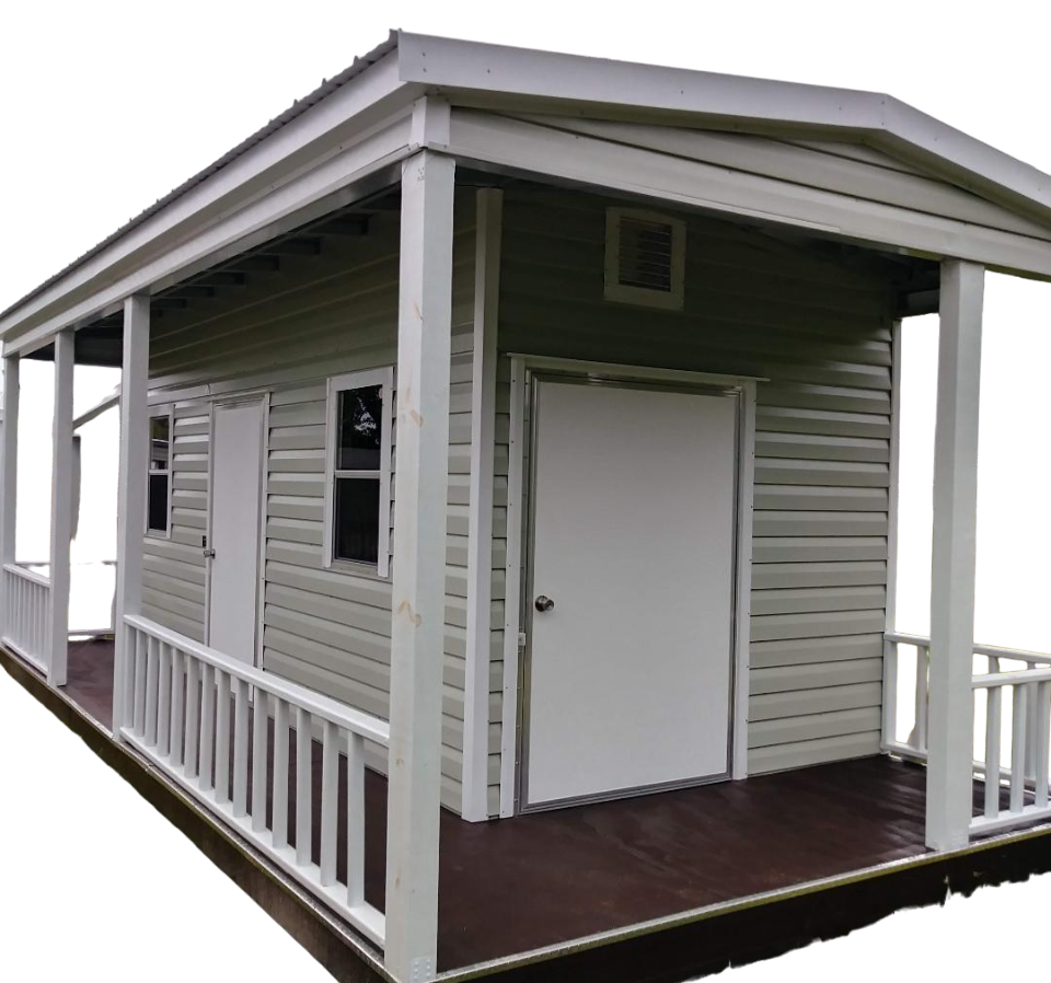 A small house with a porch and a white door