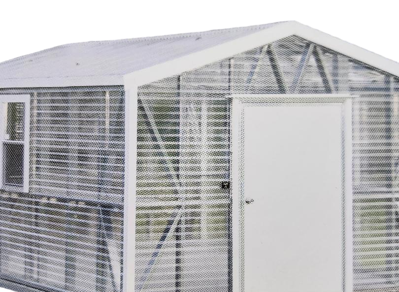 A greenhouse with a white roof and a door