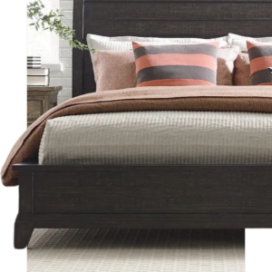Modern bed with brown and cream bedding, striped pillows, and a plant beside it in a bright bedroom