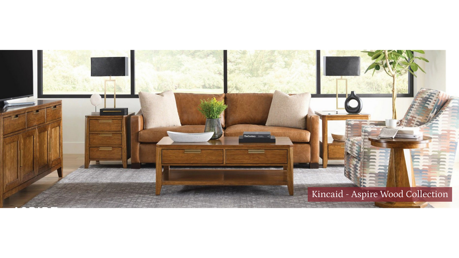 Living room with cream sofa, brown sectional, coffee table, and decorative side tables.
