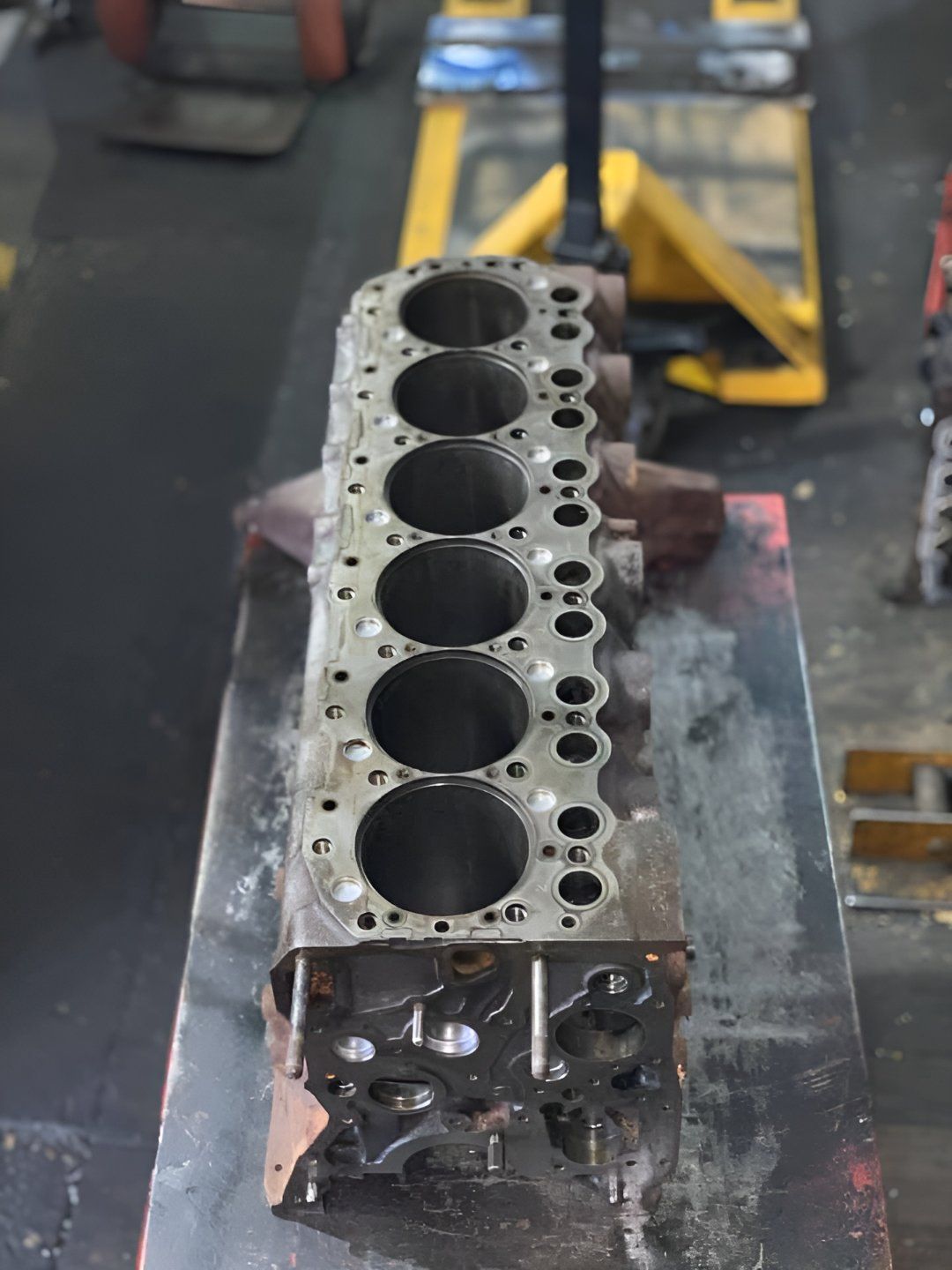 A Cylinder Block is Sitting on a Table in a Gallery — Currie Bros Engine Reconditioners in Port Macquarie, NSW
