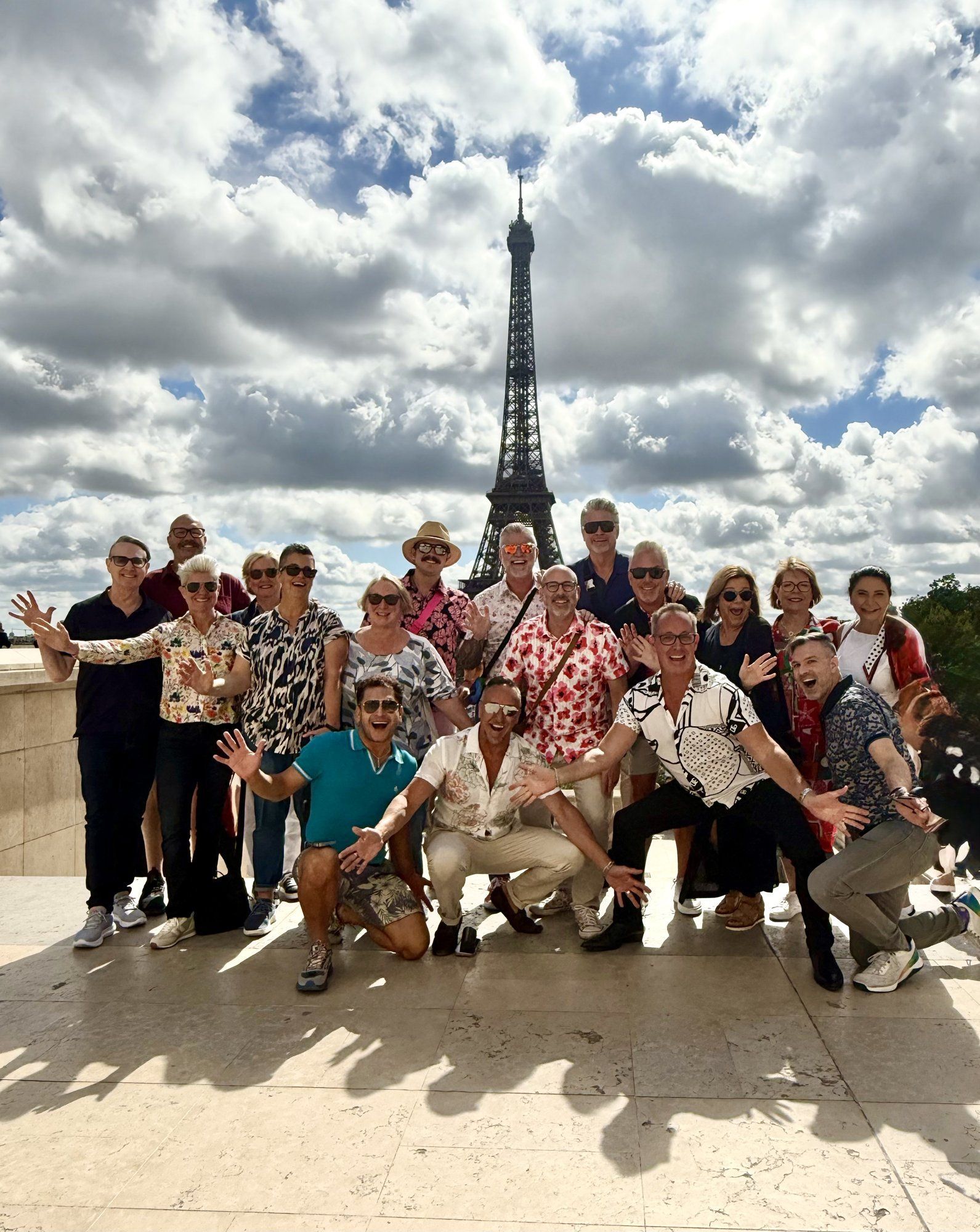 Hermes Holidays group in front of the Eiffel Tower, gay tour of Paris