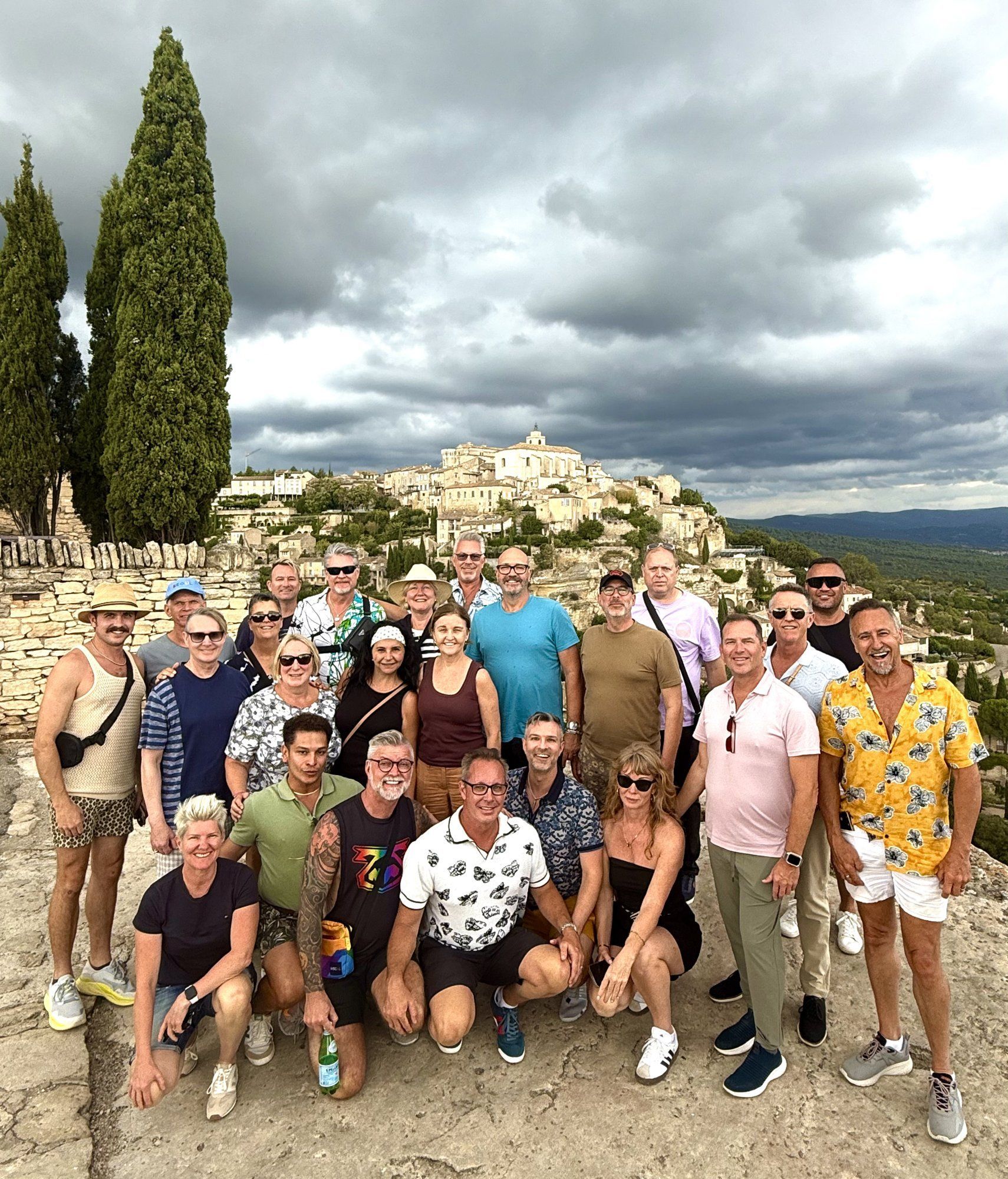 Hermes Holidays group above the hilltop village of Gordes, gay tour of Provence