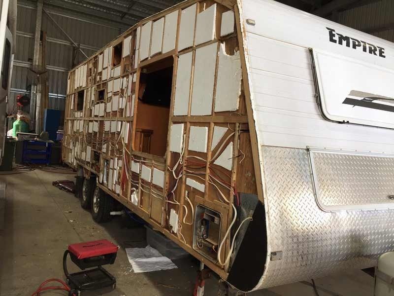 A Camper Is Being Dismantled In A Garage — Cairns Caravan Repairs In Edmonton, QLD