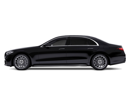 Black luxury sedan in side view on a white background