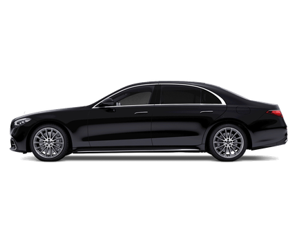 Black luxury sedan in side view on a white background