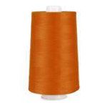 Orange thread spool with white plastic ends