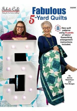 Magazine cover for “Fabulous 5-Yard Quilts” with two women and a large lit number 5 quilt display