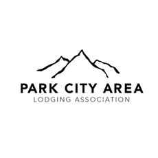 Park City Area Lodging Association logo with mountain outline in black on white background