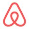 Red Airbnb logo with stylized heart-shaped outline on white background