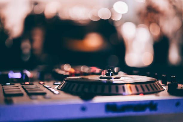 A close up of a dj's turntable with a record on it.