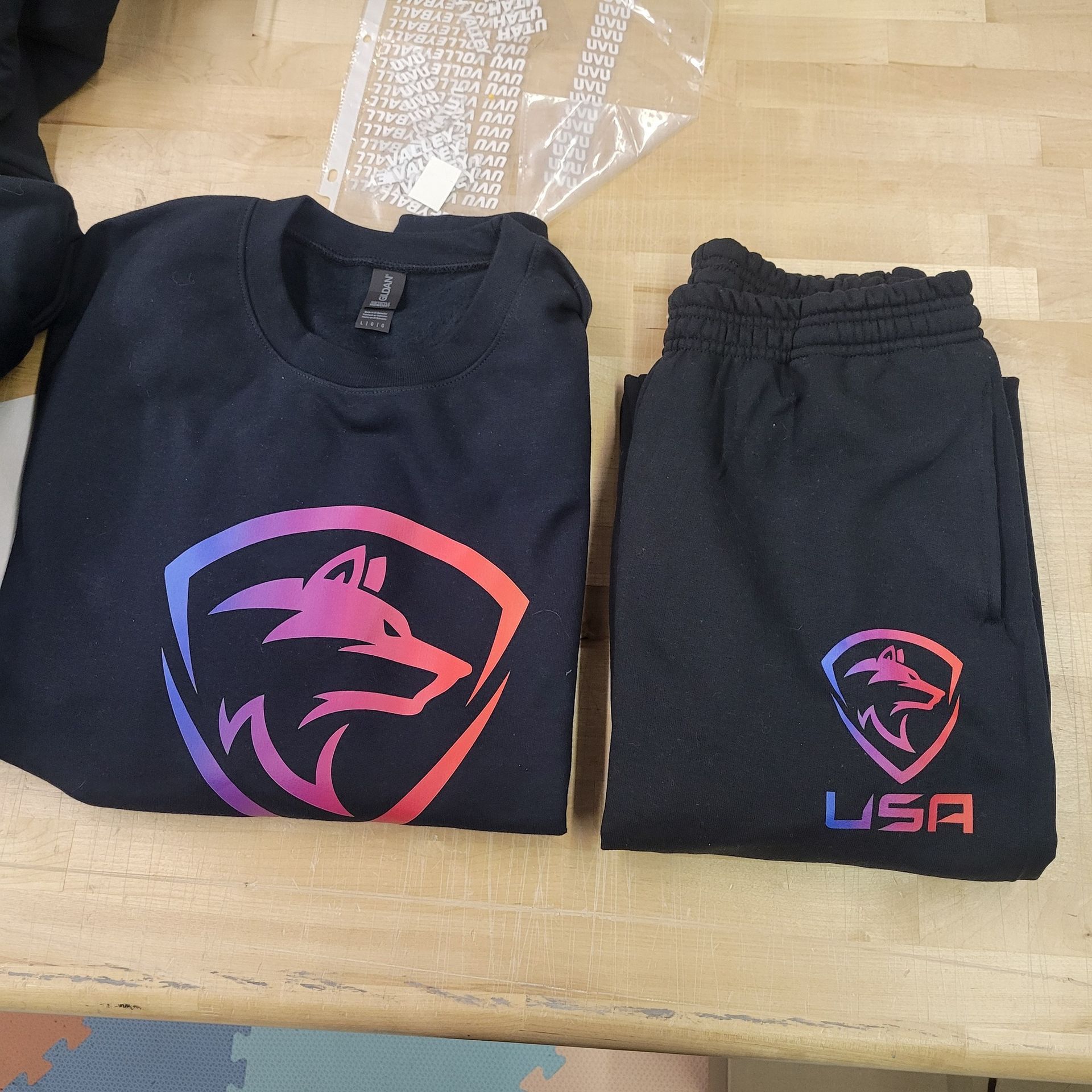 A black shirt with a wolf and the word usa on it