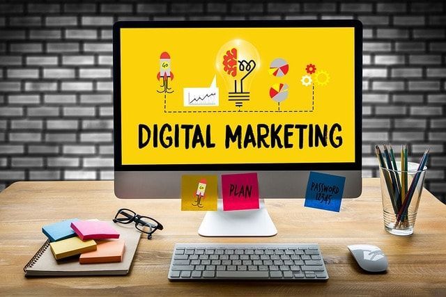 A computer monitor with the word digital marketing on it.