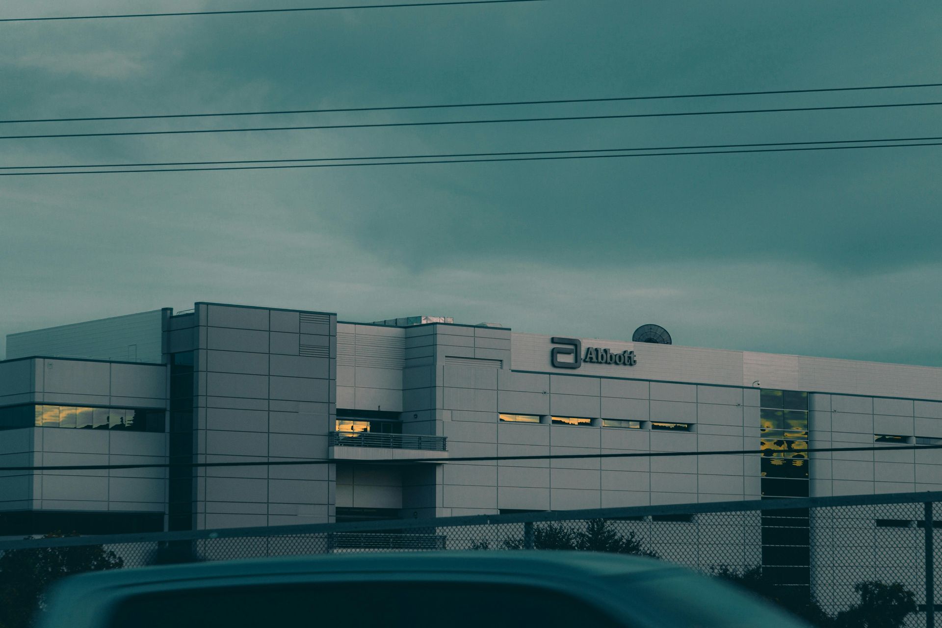 A large white building with the word abbott on it