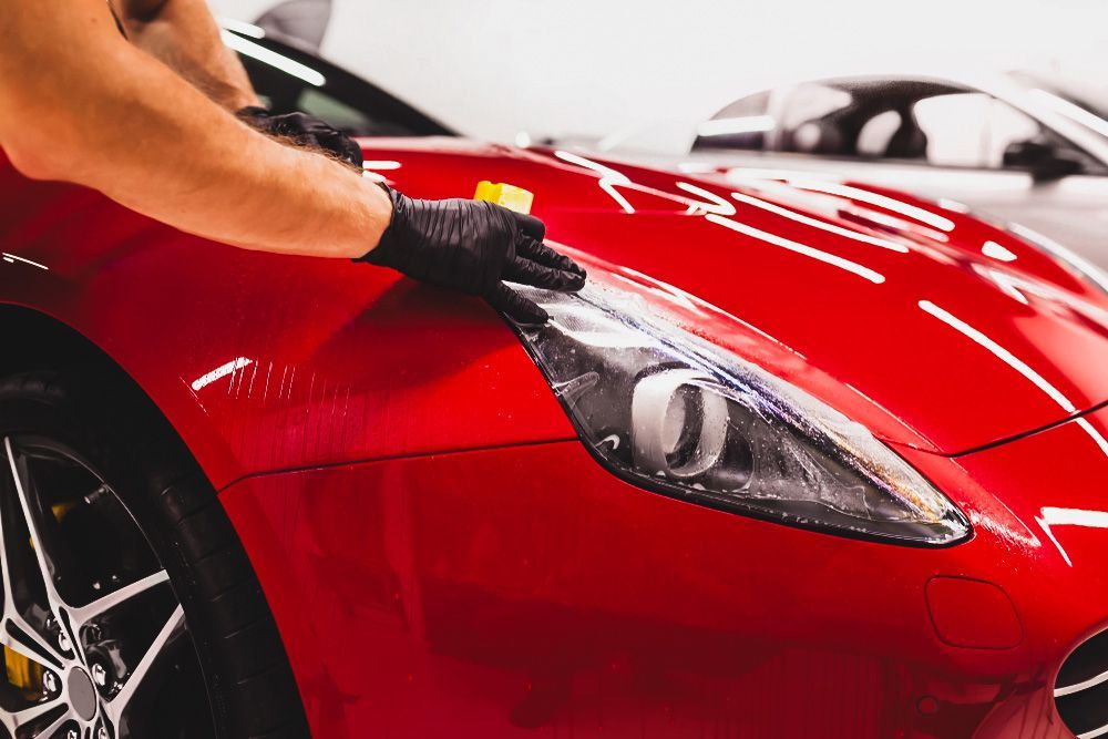 Mechanic Fixing Red Card Detailing — Old School Custom And Collision in Fawkner, VIC