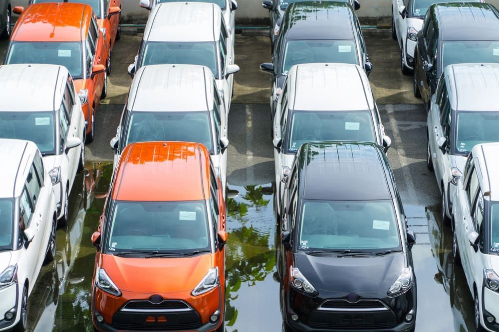 A Fleet of Parked Cars Tightly Lined up In a Lot — Old School Custom And Collision in Fawkner, VIC