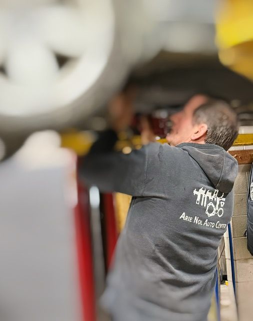 Mechanic working on a car | Arie Nol Auto Center