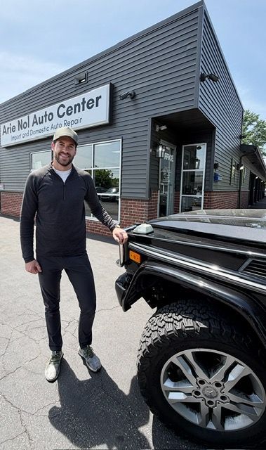 Shop exterior and office door | Arie Nol Auto Center