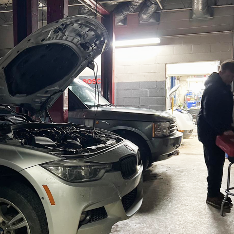 Mechanic near a car | Arie Nol Auto Center, Inc