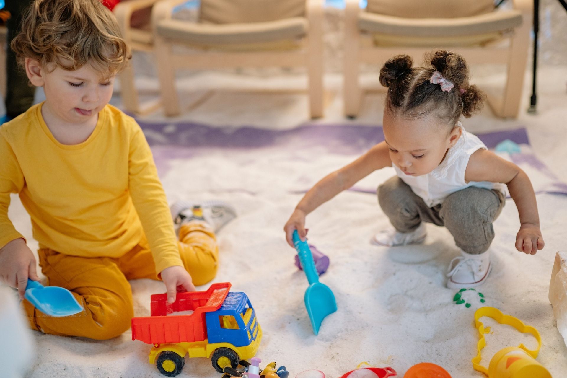 Children Playing in Sand Pit