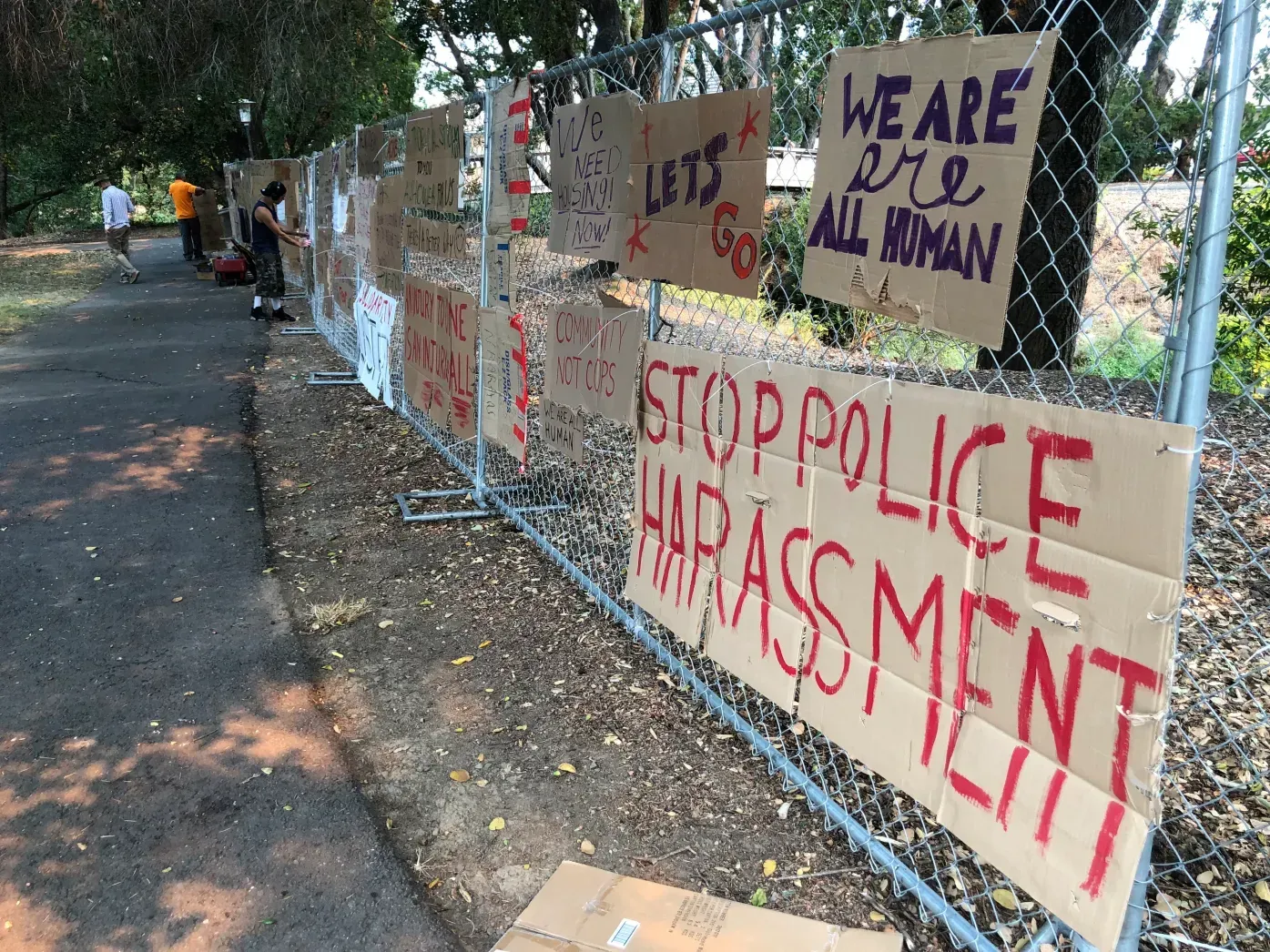 The early days - Protest signs at Camp Compassion