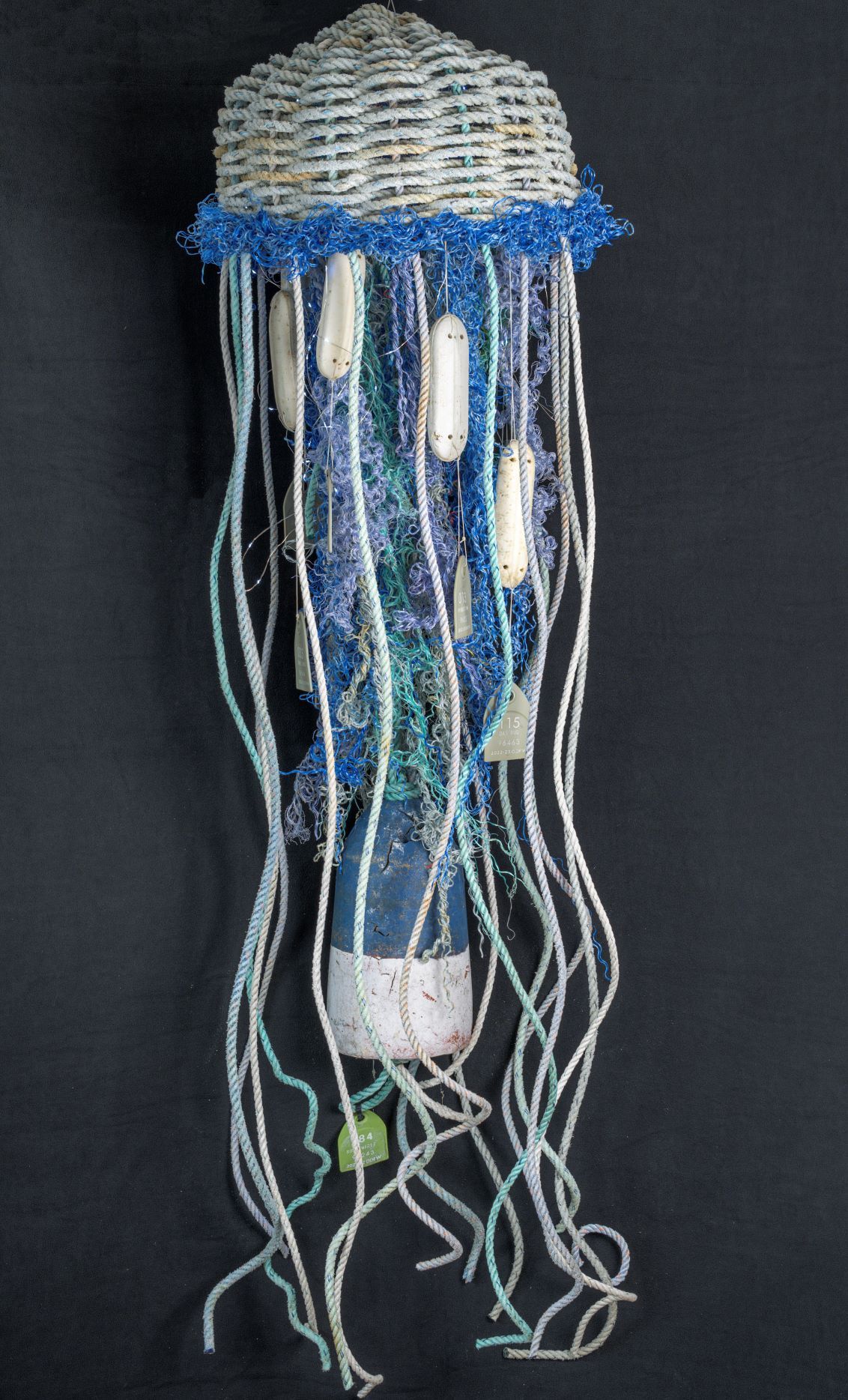 A jellyfish made out of plastic bottles and ropes