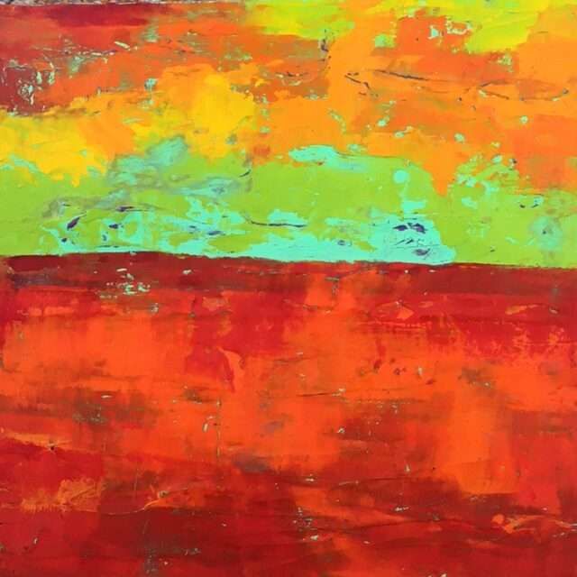 A close up of a colorful painting on a canvas.