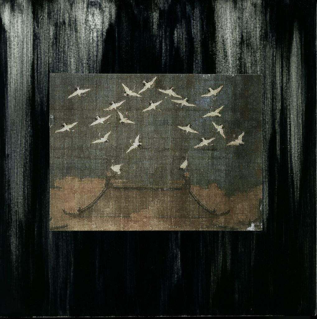A painting of a tree with birds flying around it