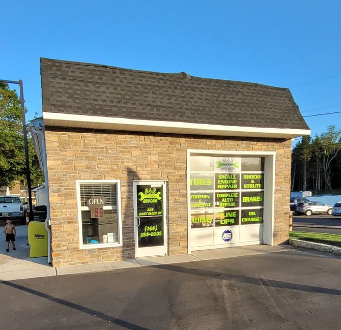 A brick building with a garage door