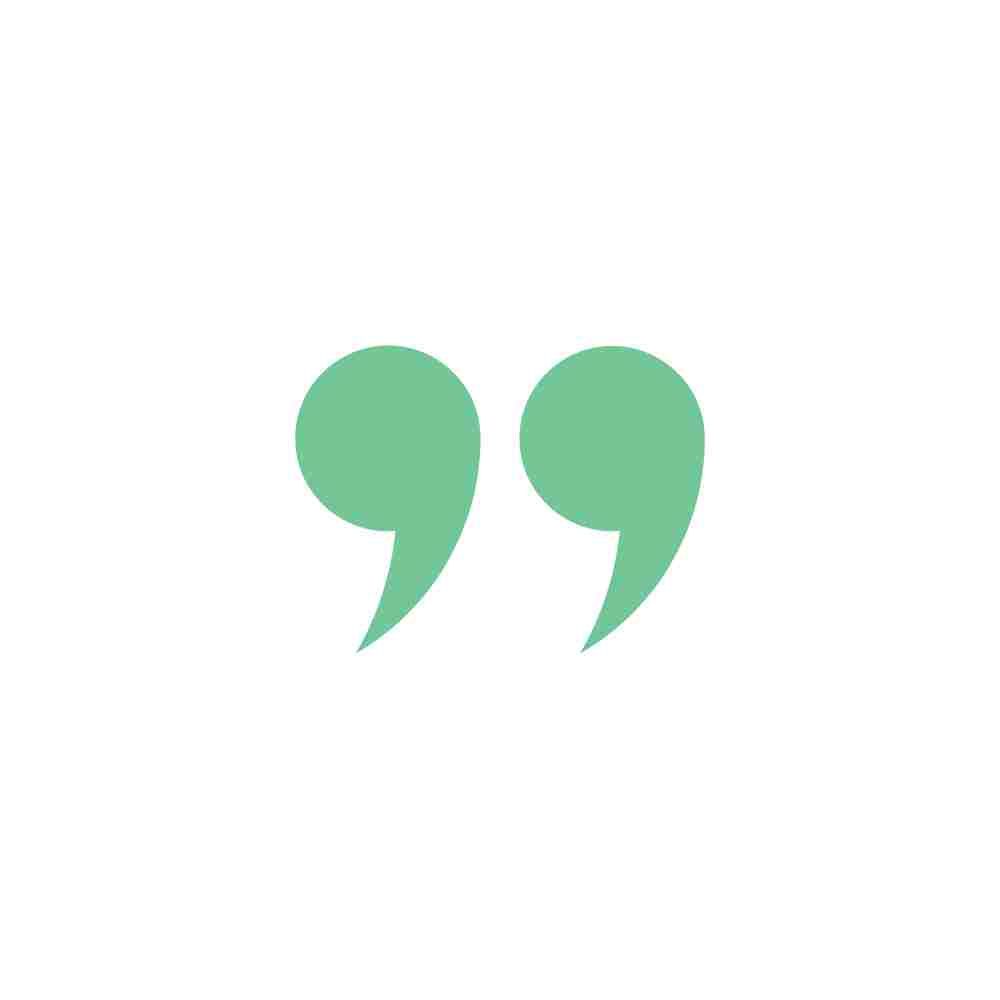 Green quotation marks icon on a white background