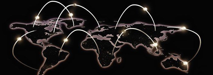 World map with glowing lines and points connecting different locations.