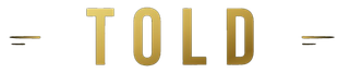 Gold “TOLD” text on a white background with small black lines on both sides