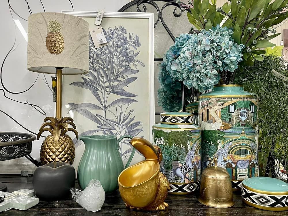 A Table Topped With Vases, a Lamp, a Pitcher, and a Picture — Tamworth Interiors in Narrabri, NSW