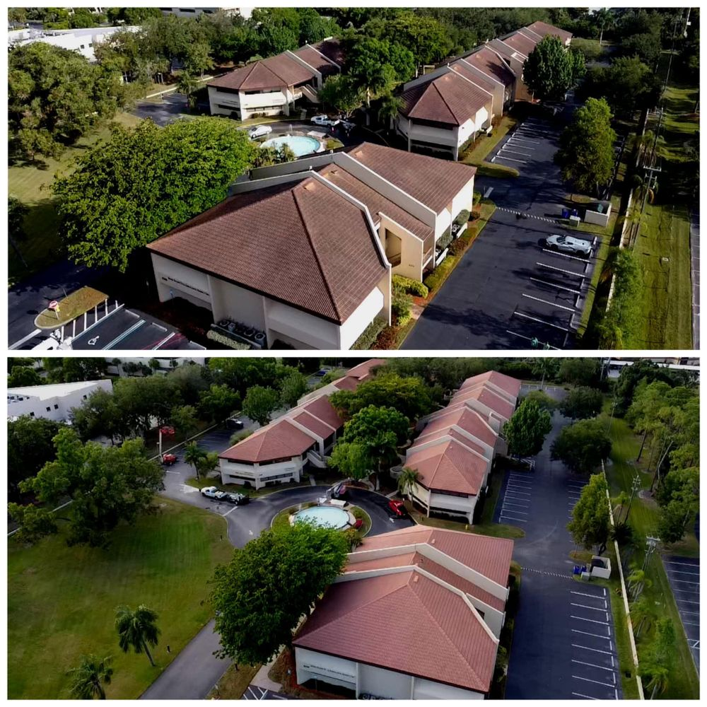 An aerial view of a residential area with a pool
