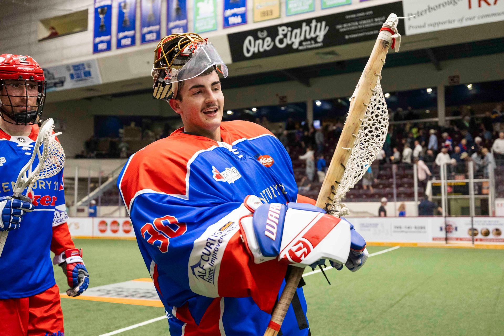 Deacan Knott smiles in the post-game handshake line