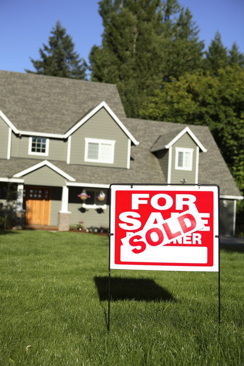 Sold Sign in Front of House — Oneonta, AL — Palisades Title & Land Sold Sign in Front of House — Oneonta, AL — Palisades Title & Land