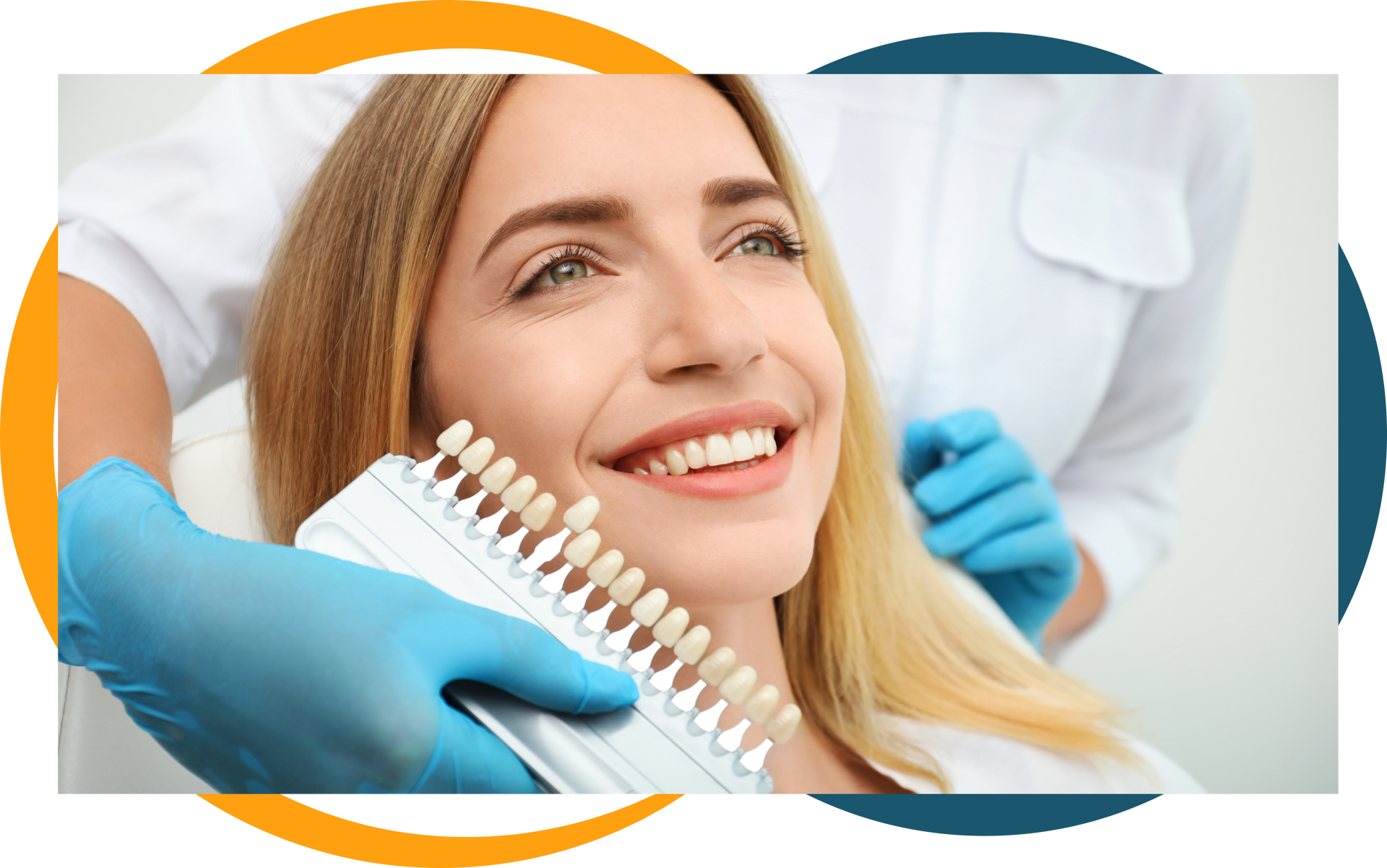 Woman with a bright smile comparing tooth shades with a dentist in a dental office.