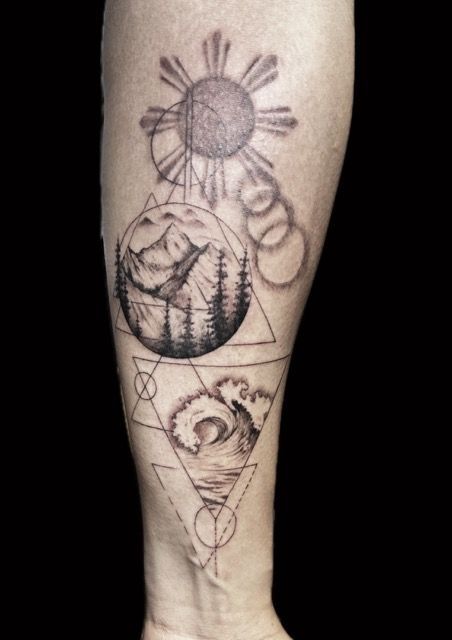 Fine-line sun, moon and mountain landscape tattoo