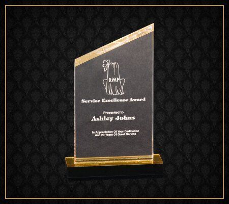 Ashley johns is presented with a service excellence award
