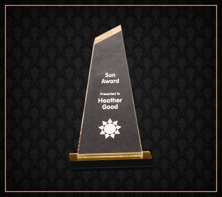 A trophy that says sun award on it