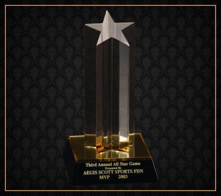 A trophy with a star on it that says third annual all star game