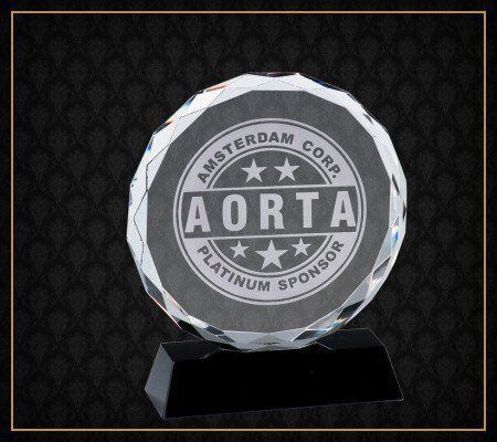 A round plaque that says aorta platinum sponsor on it
