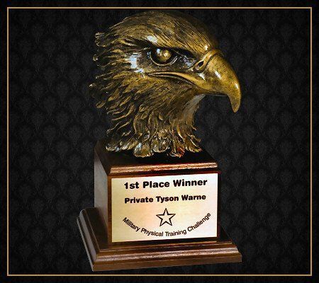 A statue of an eagle with a plaque that says 1st place winner